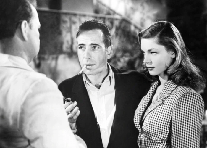 Лорен Бэколл и Хамфри Богарт в фильме «Иметь и не иметь», 1944 г. Лорен Бэколл и Хамфри Богарт в фильме «Иметь и не иметь», 1944 г.